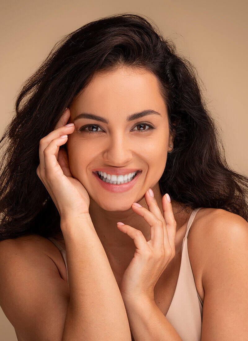 happy smiling woman with beautiful eyebrows